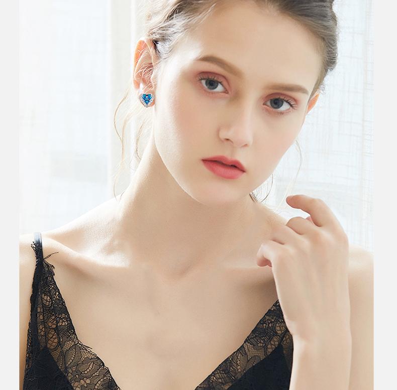 Wings of an Angel Heart Blue Topaz Necklace and Earring Set   - ALILY