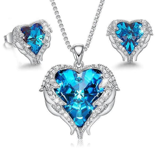 Wings of an Angel Heart Blue Topaz Necklace and Earring Set   - ALILY